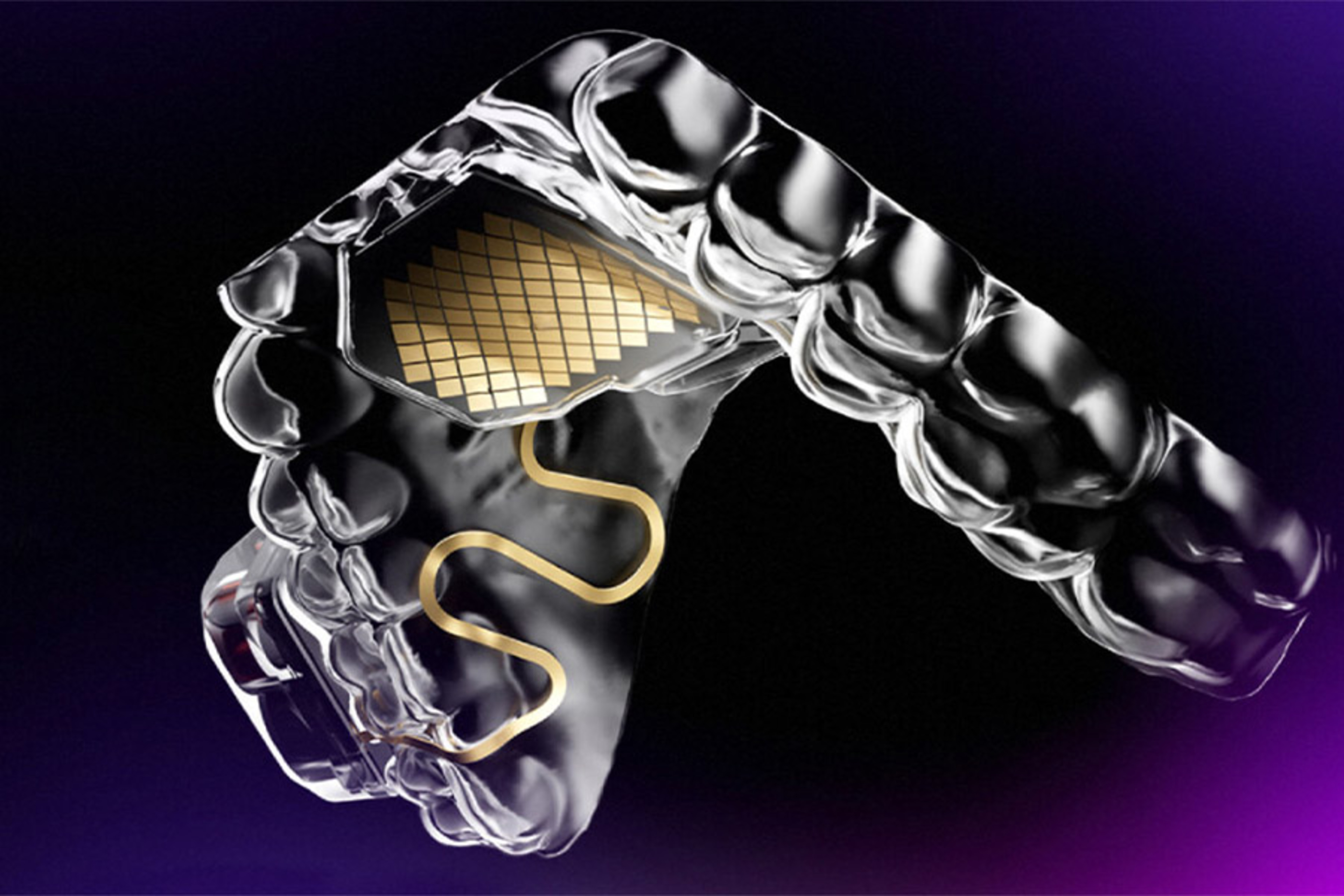 MouthPad assistive-device campaign image showing the custom mouth-controlled trackpad.
